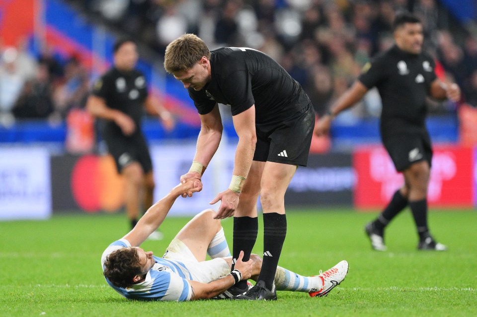 Jordie Barrett consoles pummelled Puma Nicolas Sanchez after defeat