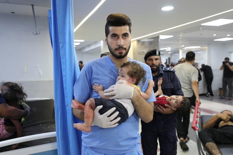 Babies being carried for treatment at the facility