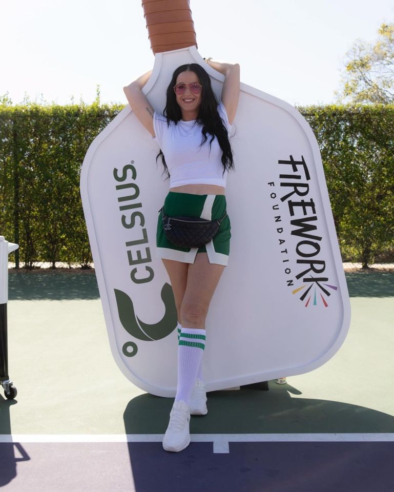 Katy Perry posed in a green miniskirt as she threw a fundraising pickleball tournament