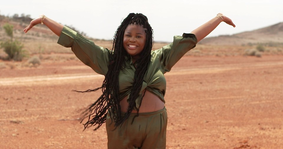 Nella is all smiles in the desert