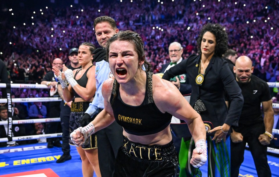 Katie Taylor celebrates defeating Chantelle Cameron in their undisputed super lightweight championship fight