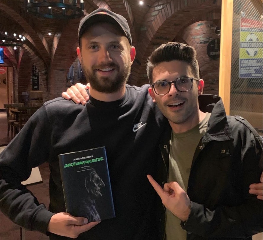 Brandon Dermer, left, with Dave Rispoli - the two men who helped to push John's career further and further into the mainstream