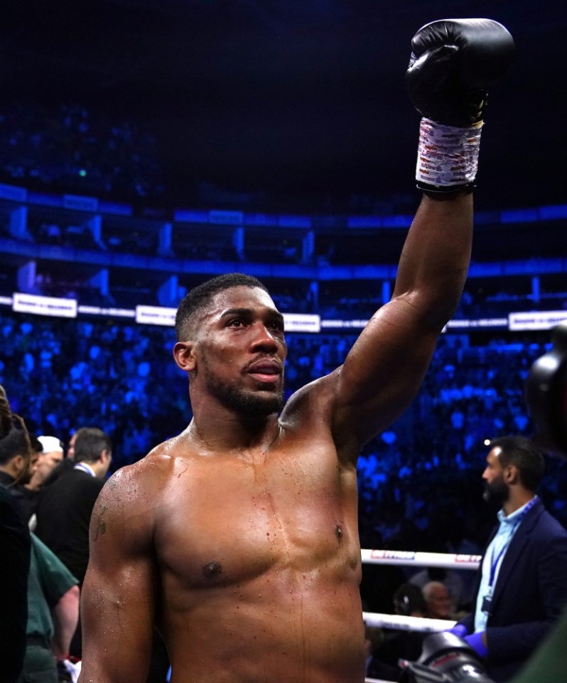 Anthony Joshua celebrates after victory in the International Heavyweight contest via knock out of Robert Helenius at the O2 Arena, London. Picture date: Saturday August 12, 2023. PA Photo. See PA story BOXING London. Photo credit should read: Nick Potts/PA Wire. RESTRICTIONS: Use subject to restrictions. Editorial use only, no commercial use without prior consent from rights holder.