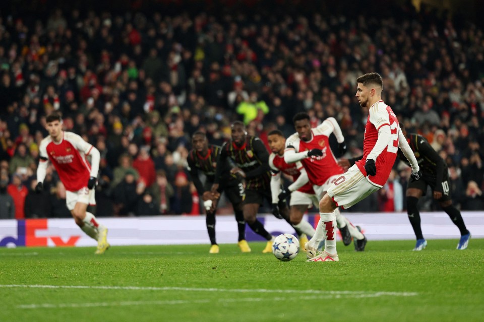 Arsenal's Italian midfielder #20 Jorginho scores his team's sixth goal from a penalty during the UEFA Champions League Group B football match between Arsenal and RC Lens at the Arsenal Stadium in north London on November 29, 2023. (Photo by Adrian DENNIS / AFP) (Photo by ADRIAN DENNIS/AFP via Getty Images)