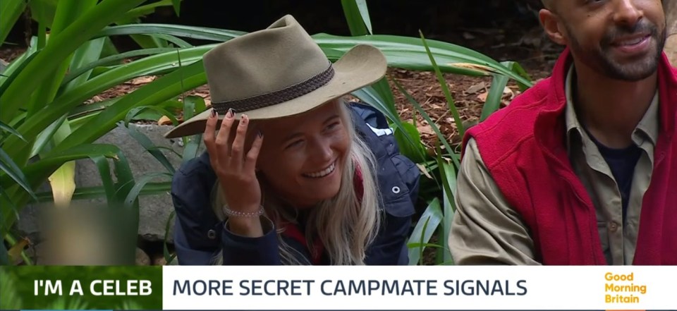 GMB's Richard Arnold thinks Danielle is sending a message by touching her hat