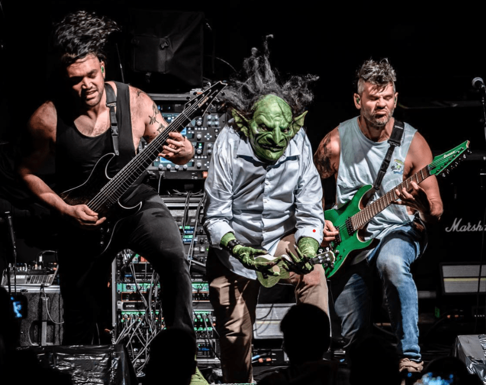Guitarist Alex Alereza, left, says that when John comes on stage the audience are stuck in a 'trance' and are so loud the crew can barely hear anything