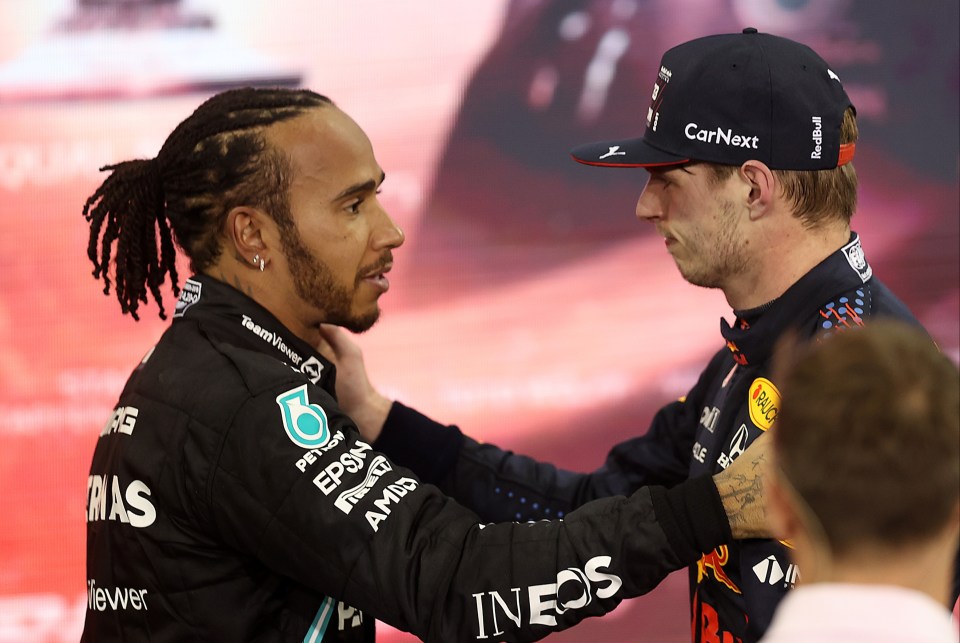 Max Verstappen and Lewis Hamilton embracing after the Abu Dhabi Grand Prix.