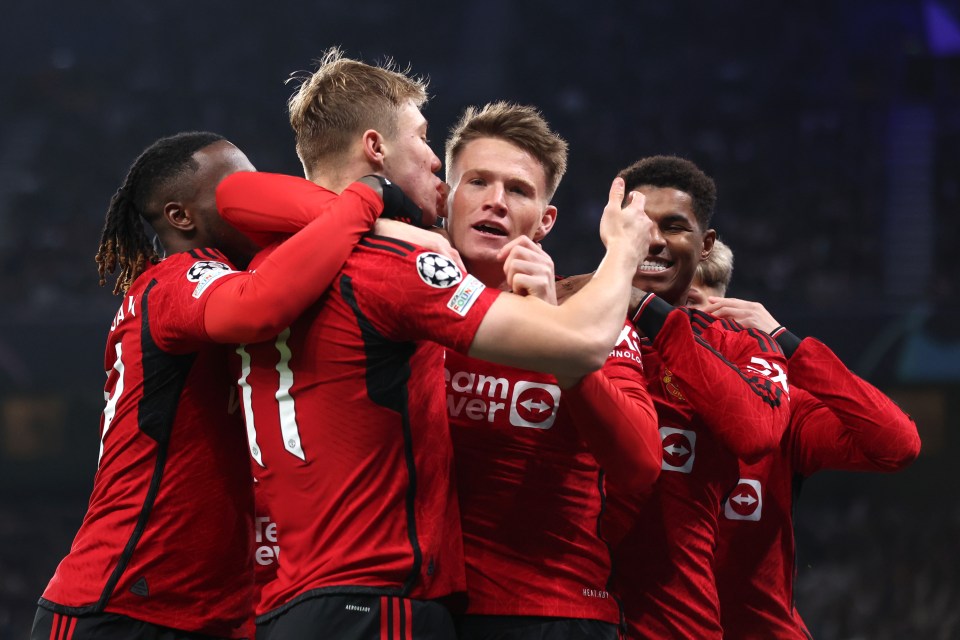 The striker celebrates with his team-mates