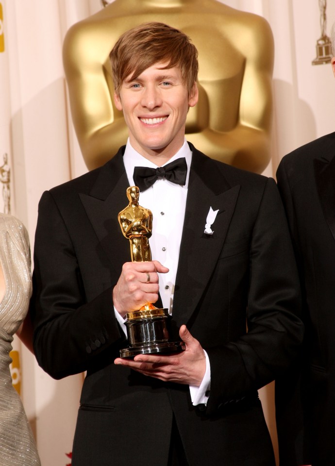 Dustin Lance Black poses with his Best Original Screenplay award for Milk at the 81st Annual Academy Awards