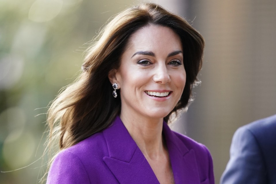 Princess Kate was snapped beaming today as she arrived at The Design Museum in London