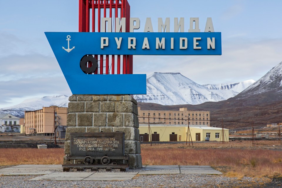 Pyramiden translates to The Pyramid because it sits at the foot of a triangular-shaped mountain