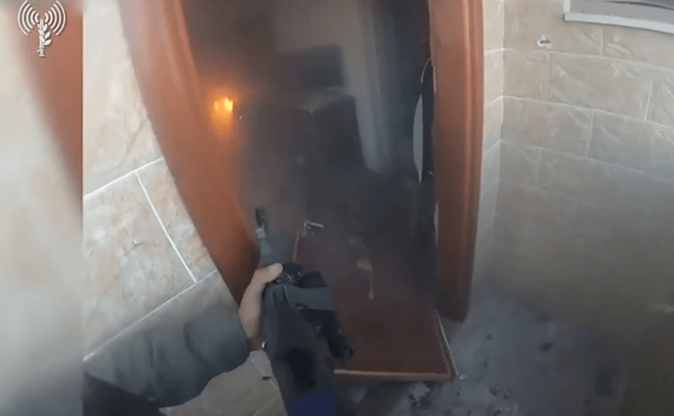 An Israeli soldier exchanges fire with Hamas terrorists in a video shared by the IDF