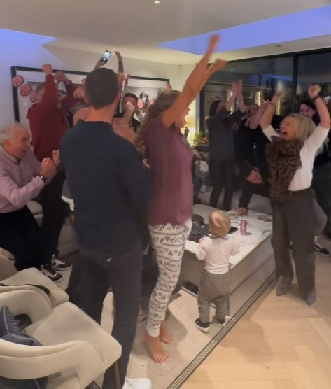 Zara showed Sam's family and friends jumping and screaming with joy