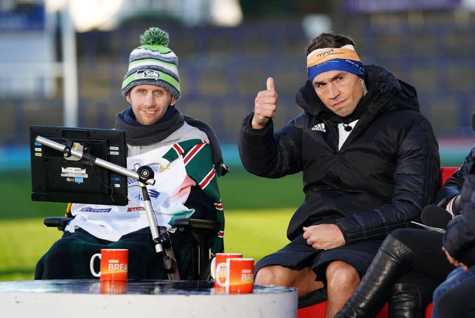 2H7G7DB Kevin Sinfield, with Rob Burrow (left), is interviewed at Headingley Stadum after completing the Extra Mile Challenge from Leicester to Leeds. Picture date: Tuesday November 23, 2021.