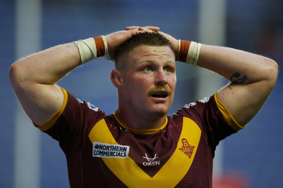 Huddersfield's Luke Yates finds himself coaching amateur players to tackle to different law than he'll be playing under