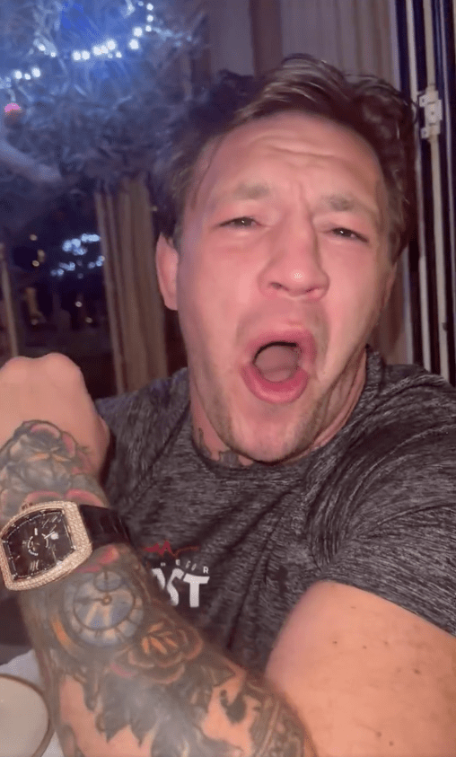 Conor McGregor laughs as he announces a fight with Michael Chandler