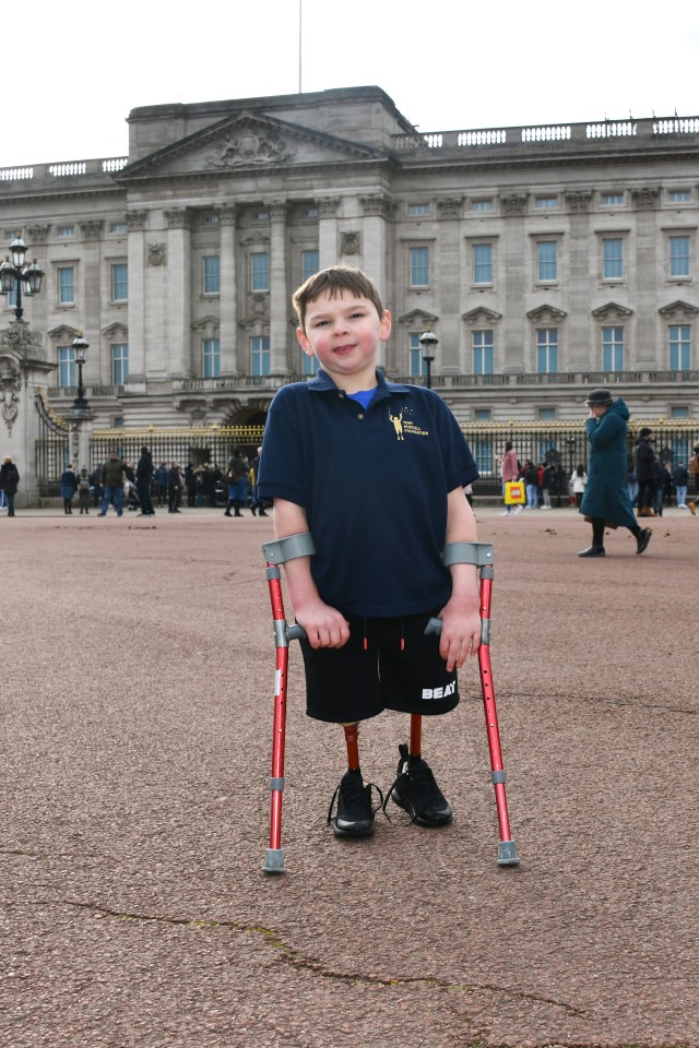 LONDON, ENGLAND - FEBRUARY 05:  Tony Hudgell poses outside Buckingham Palace to celebrate Jack Hopkins running 100 days to raise funds for the Tony Hudgell Foundation on February 5, 2022 in London, England.  (Photo by David M. Benett/Dave Benett/Getty Images)