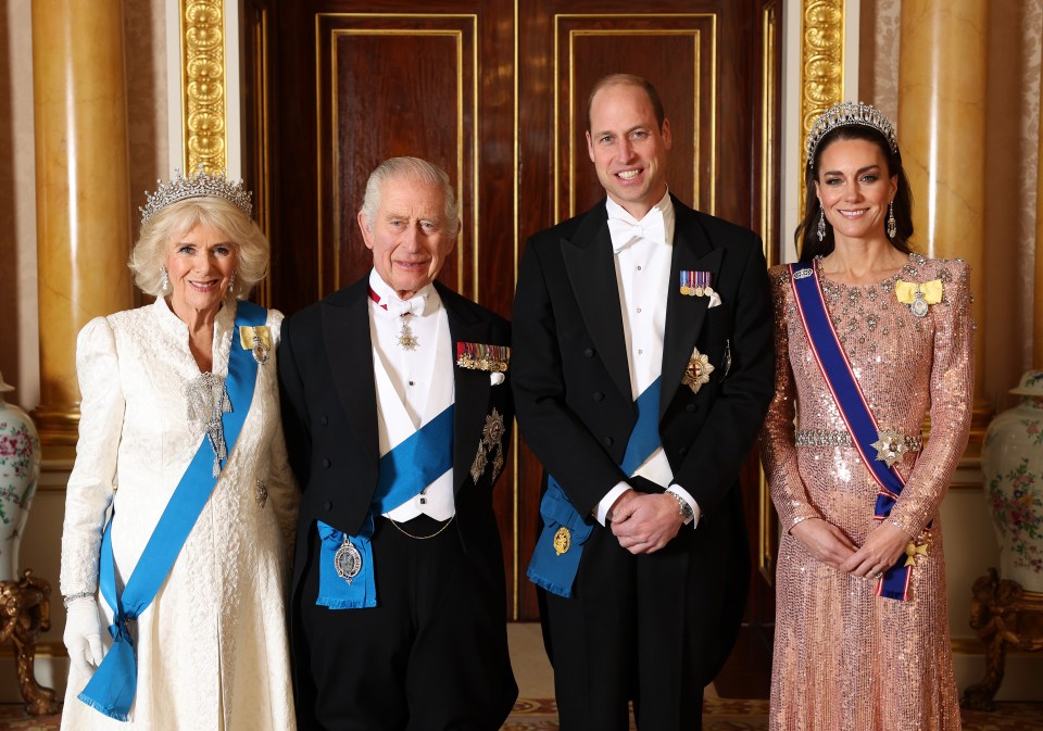 Queen Camilla, King Charles III, Prince William, Prince of Wales and Catherine, Princess of Wales pose for a photo