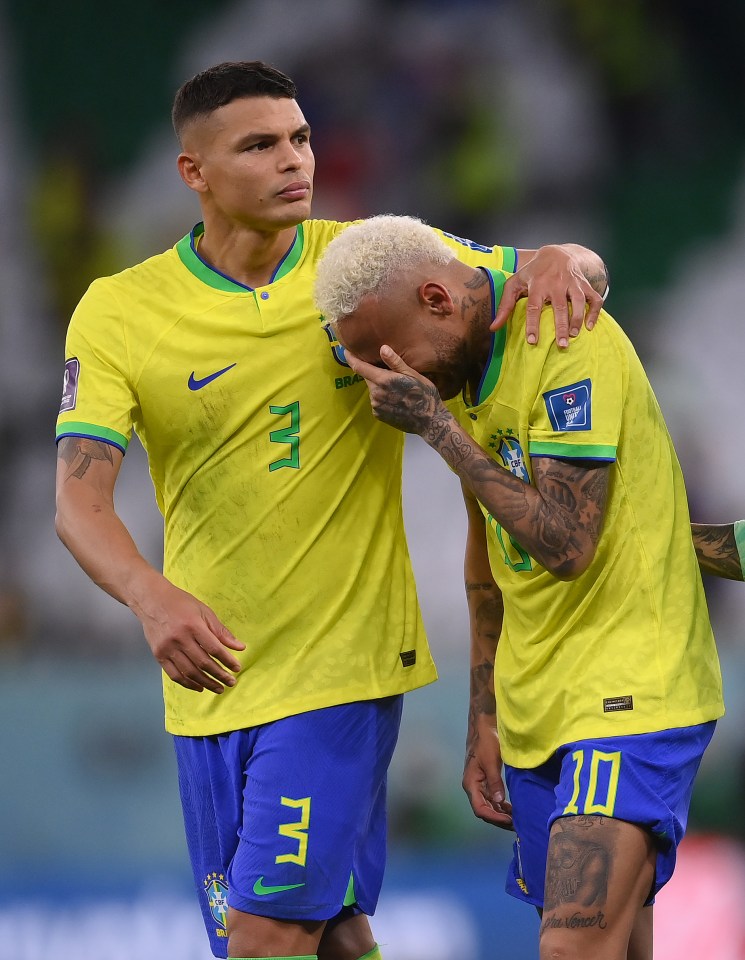 AL RAYYAN, QATAR - DECEMBER 09: Neymar of Brazil is consoled by Thiago Silva after the loss via a penalty shootout during the FIFA World Cup Qatar 2022 quarter final match between Croatia and Brazil at Education City Stadium on December 09, 2022 in Al Rayyan, Qatar. (Photo by Laurence Griffiths/Getty Images)