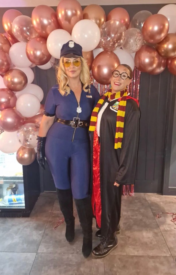 a woman in a police uniform stands next to a woman in a harry potter costume