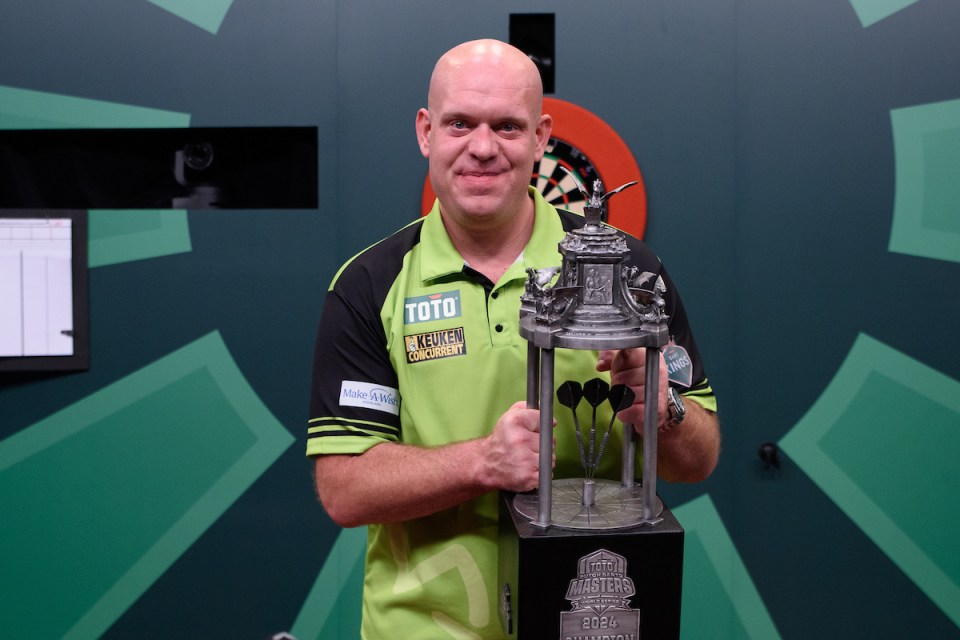 Michael van Gerwen tears up as he lifts trophy after Dutch Darts Masters win