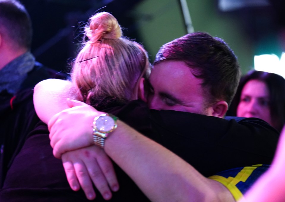 Littler enjoyed a tender moment with his girlfriend Eloise Milburn