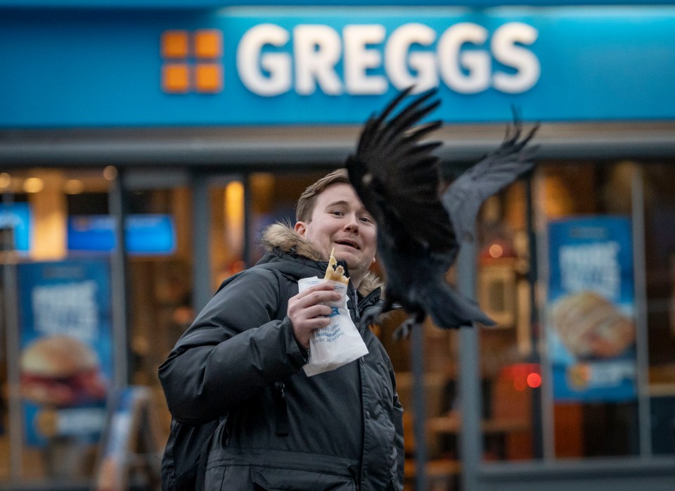 Sun man Andy Robinson gets attacked by the Twickenham Crows outside Greggs bakers