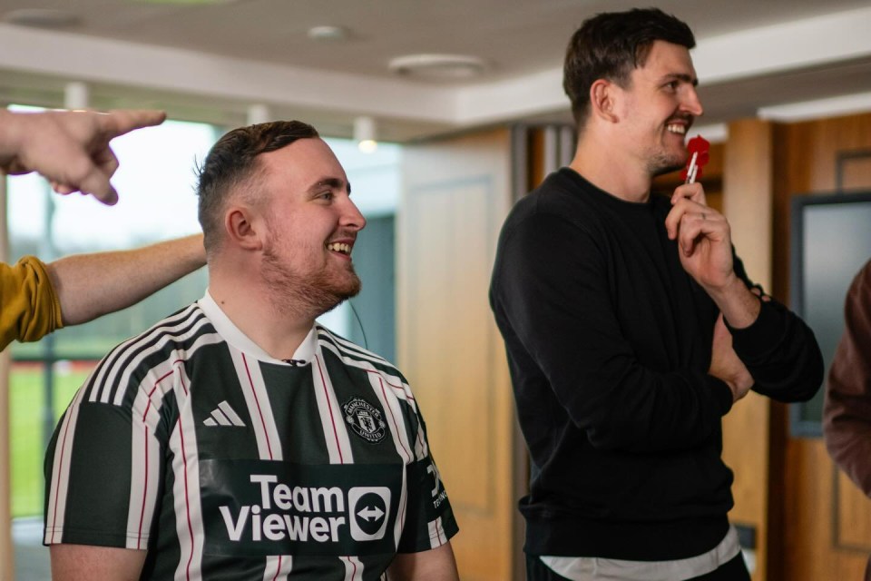 The darts superstar faced off against Harry Maguire