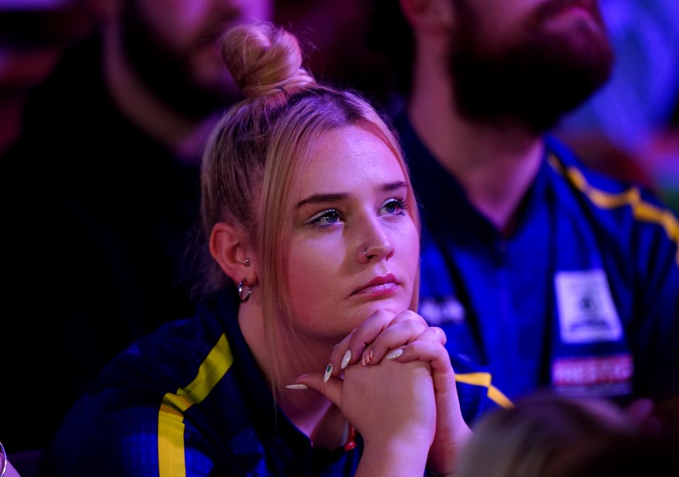 She watched on nervously with Littler's parents