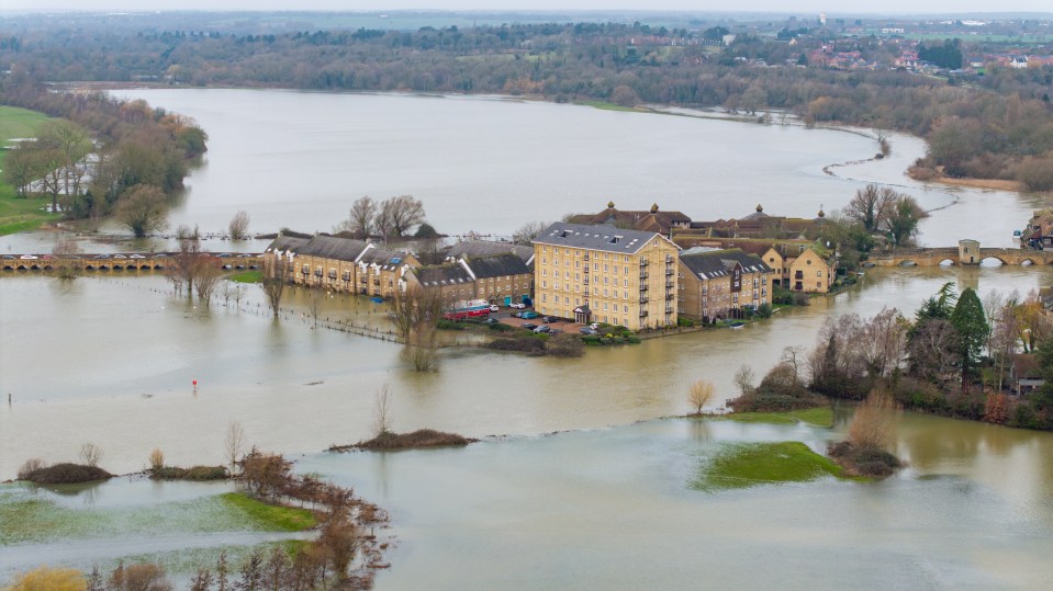 Pictures from Thursday showed the town of St Ives, Cambs, made an island when the River Great Ouse breached its banks