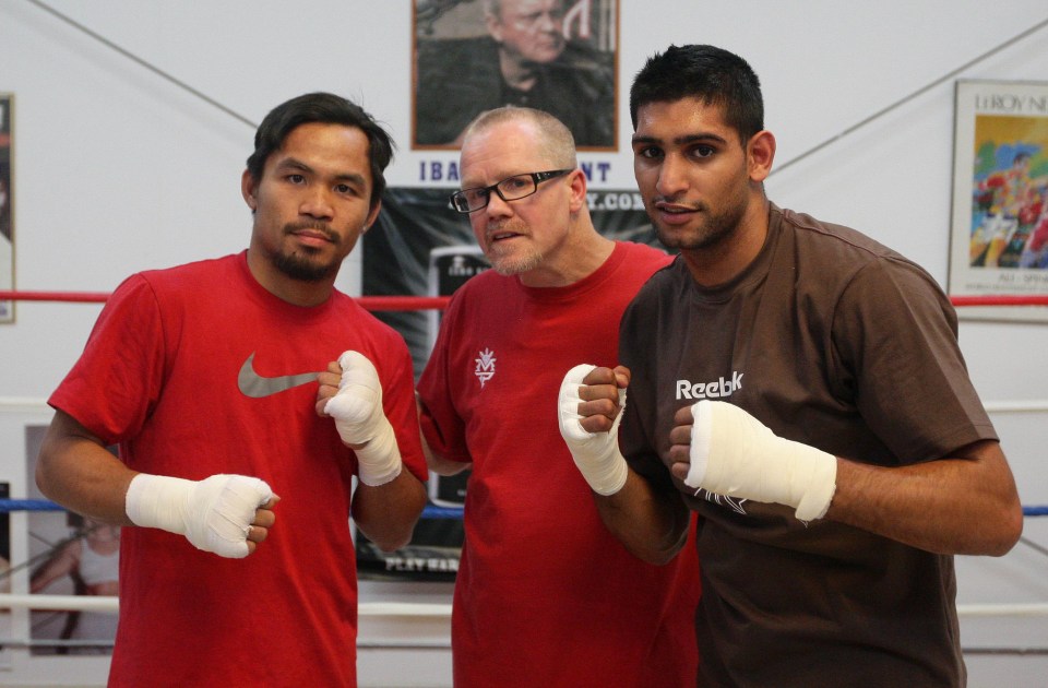 Pacquiao formerly sparred Amir Khan when both training with Freddie Roach, centre
