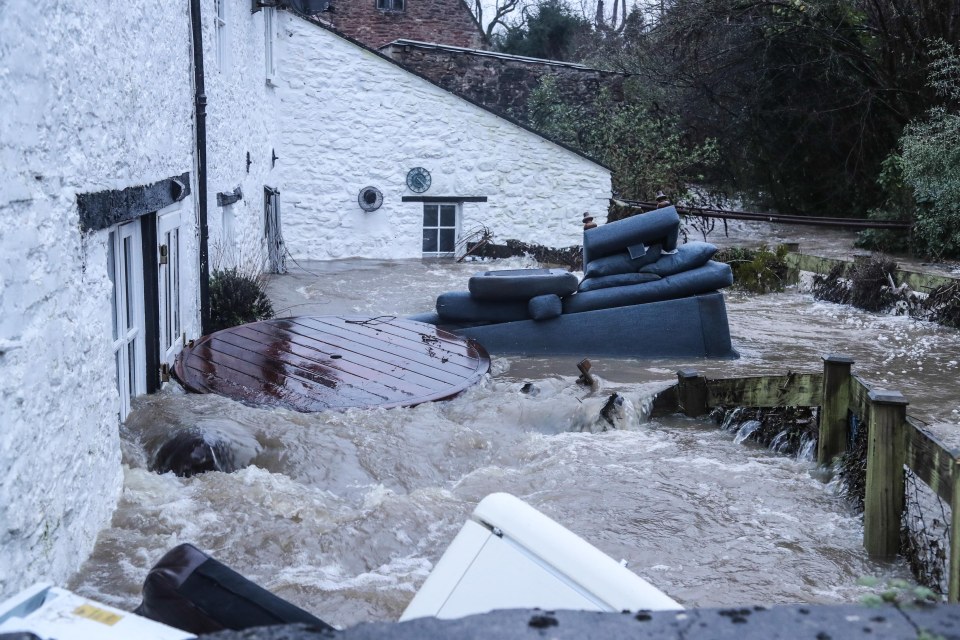 Furniture including sofas and tables were seen floating through the village of Croscombe