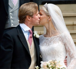  Thomas Kingston kissing his new wife on their wedding day in 2019