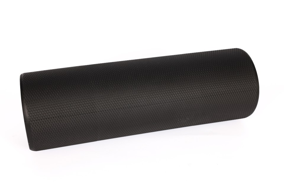 The foam roller has a textured surface for better grip