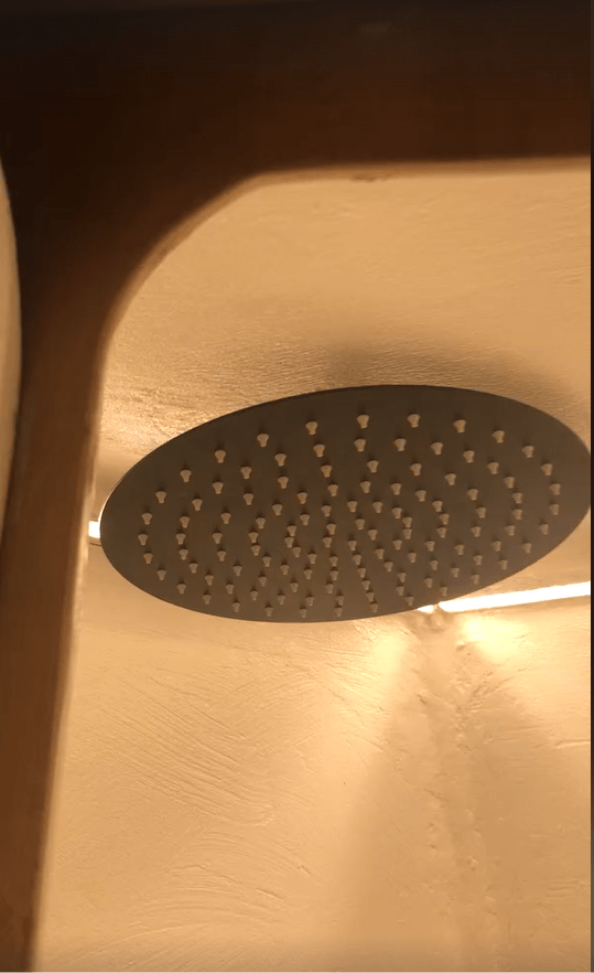 They even installed a swish shower cubicle