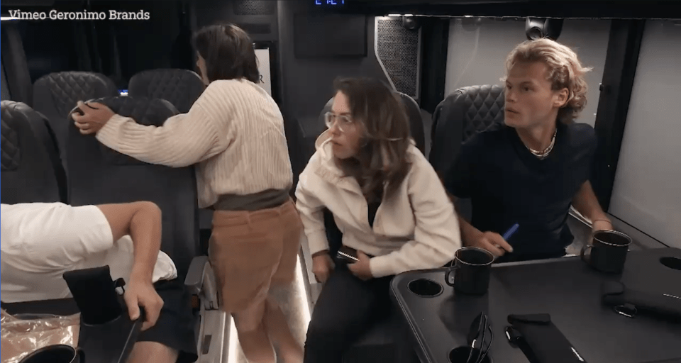 a group of people sitting on a bus with vimeo geronimo brands written on the bottom
