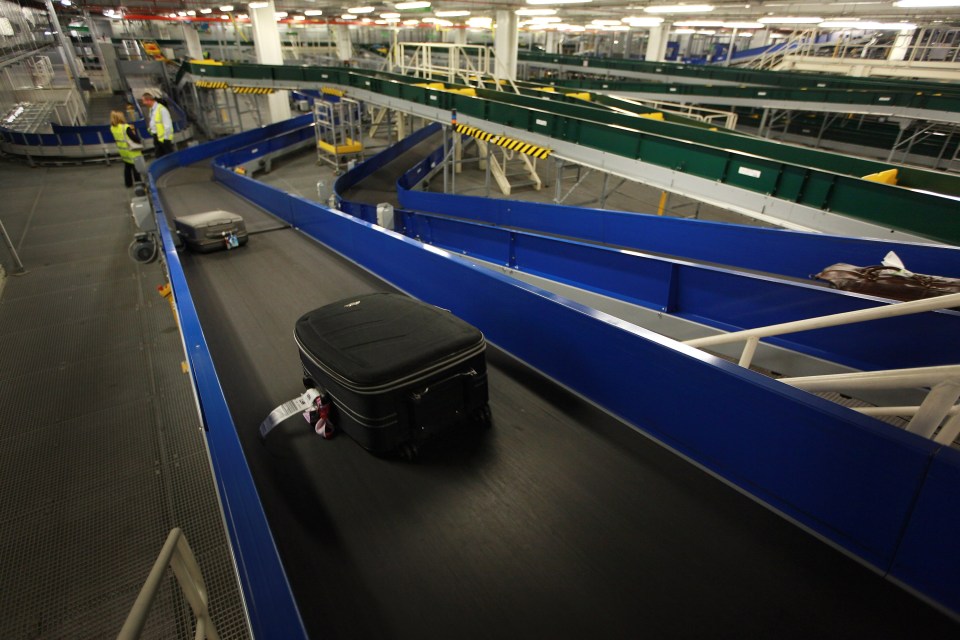 A woman is in critical condition after getting pulled into airport machinery