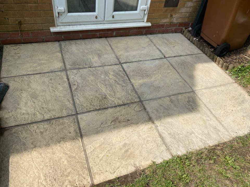 Patio stones next to a house.