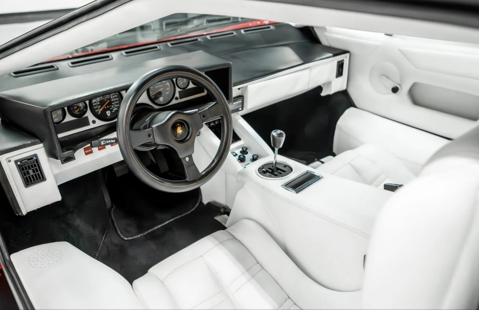 The bright red motor stands out even more from the outside due to it's crisp white interiors