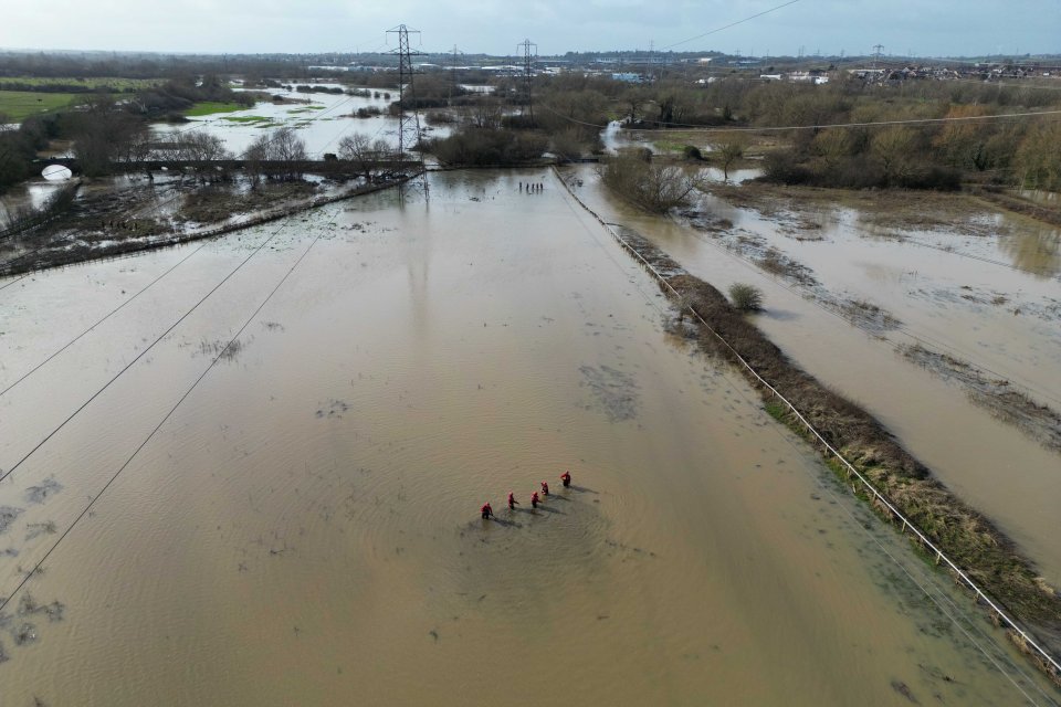A search operation underway on the flooded fields in Leicester