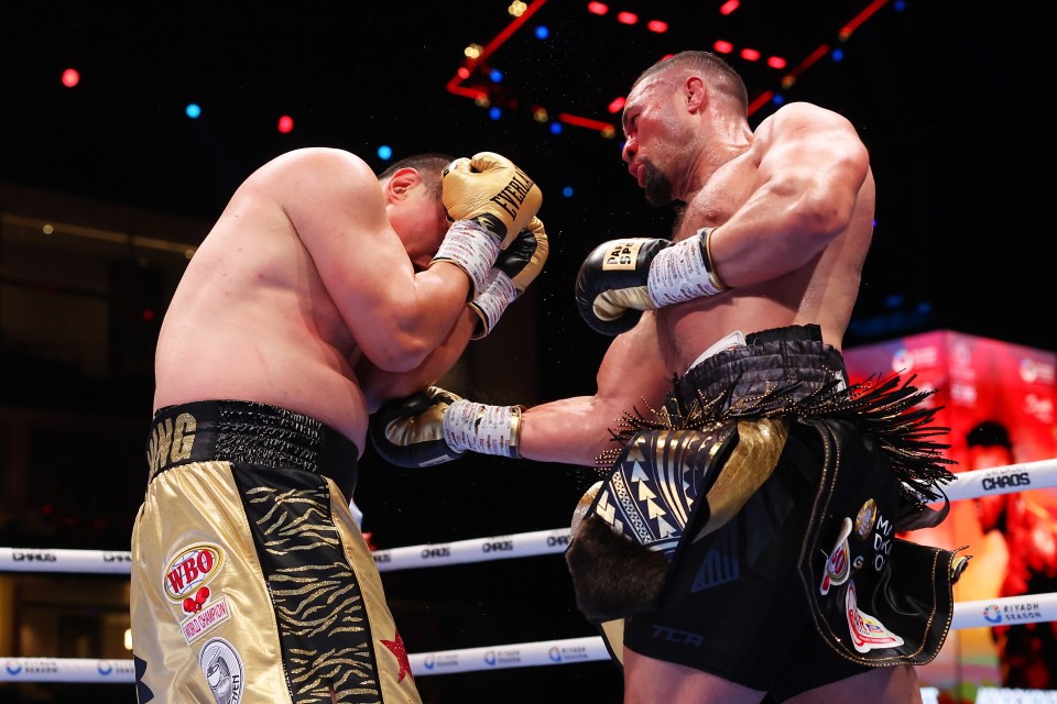 RIYADH, SAUDI ARABIA - MARCH 08: Joseph Parker punches Zhilei Zhang during the WBO Interim World Heavyweight title fight between Zhilei Zhang and Joseph Parker on the Knockout Chaos boxing card at the Kingdom Arena on March 08, 2024 in Riyadh, Saudi Arabia. (Photo by Richard Pelham/Getty Images)