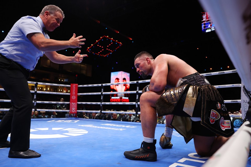 RIYADH, SAUDI ARABIA - MARCH 08: Referee Michael Alexander counts down Joseph Parker after being knocked down by Zhilei Zhang (not pictured) during the WBO Interim World Heavyweight title fight between Zhilei Zhang and Joseph Parker on the Knockout Chaos boxing card at the Kingdom Arena on March 08, 2024 in Riyadh, Saudi Arabia. (Photo by Richard Pelham/Getty Images)