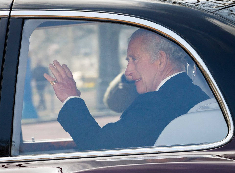 He was snapped leaving Clarence House in Westminster, central London