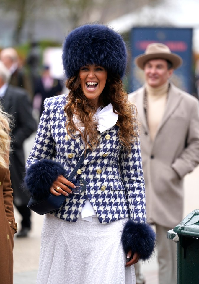 Glam guests appeared in high spirits as they arrived at the rainy racecourse