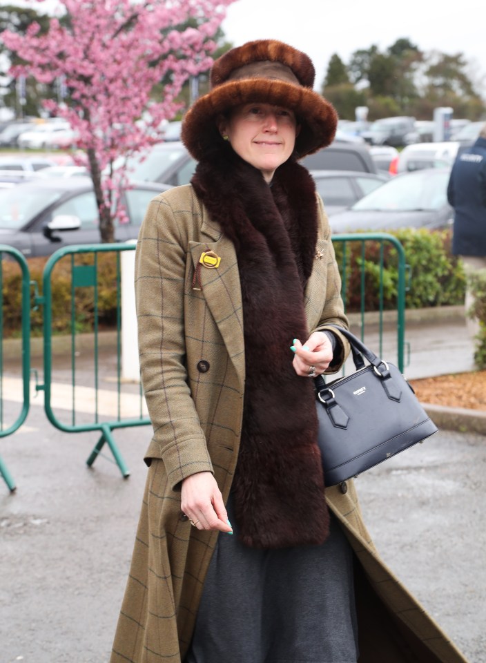 This attendee went for a snug, wrapped-up look for the outdoor event