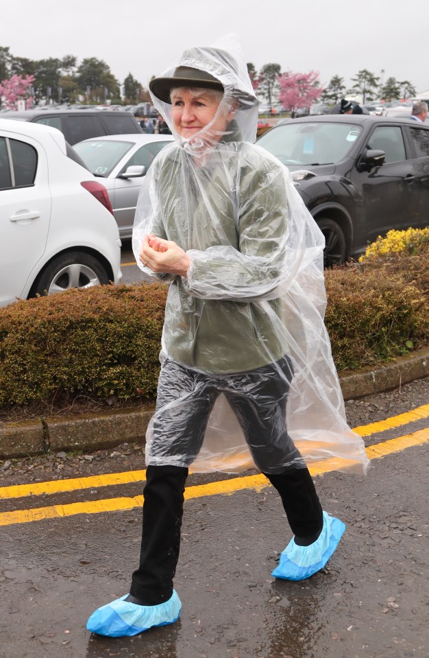 Some guests have been creative in their outfit choices, given the soggy weather