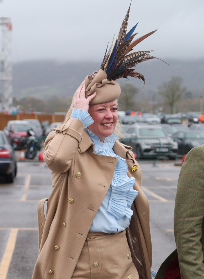 Revellers are battling the winds and the rain at the famous racing meet