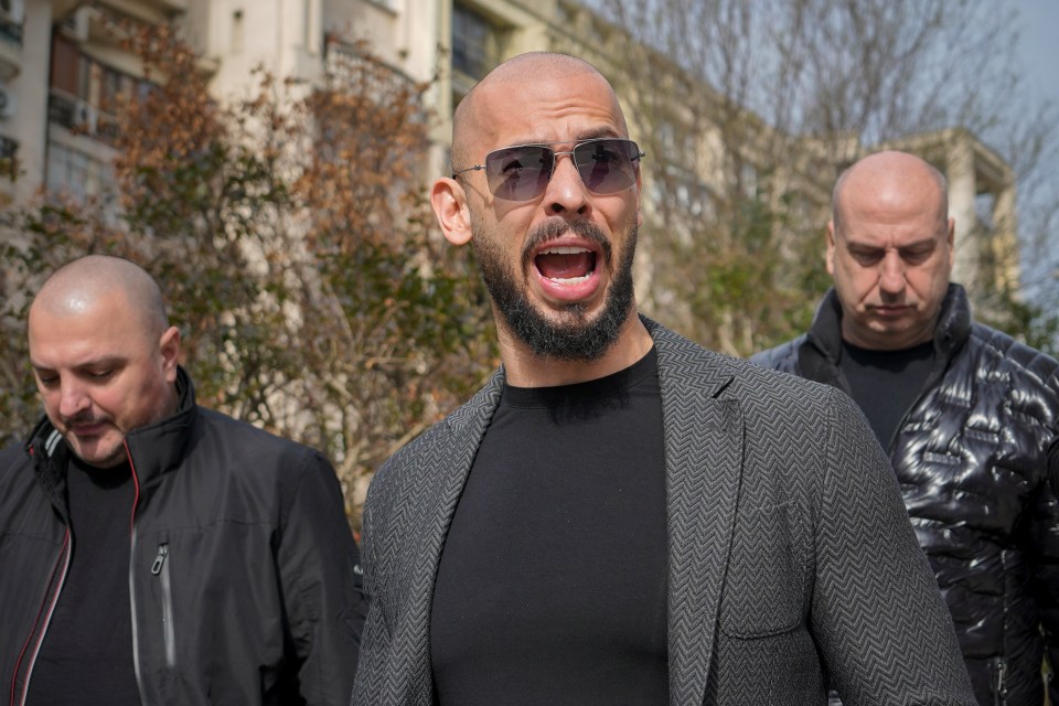 Andrew Tate grimaces as he arrives at the Bucharest Tribunal in Bucharest, Romania, Monday, Feb. 26, 2024. (AP Photo/Vadim Ghirda)