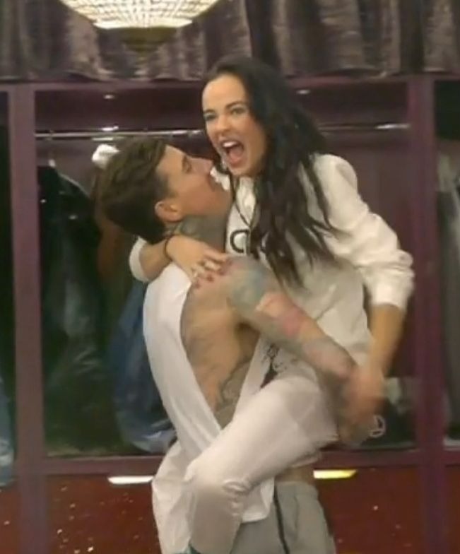 Jeremy McConnell and Stephanie Davis embracing on the Celebrity Big Brother TV show.