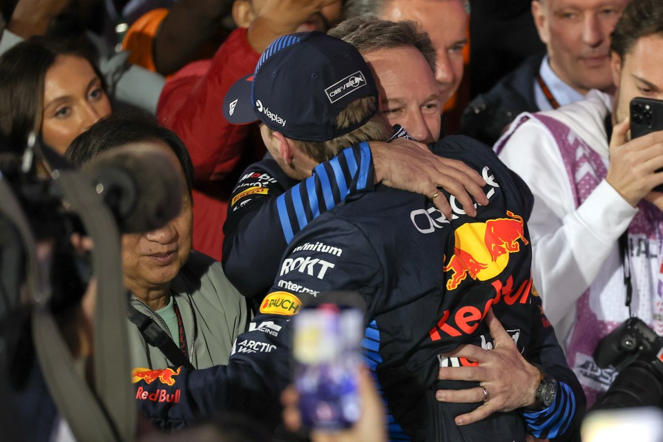 Horner and Verstappen hug each other in celebration on Saturday night